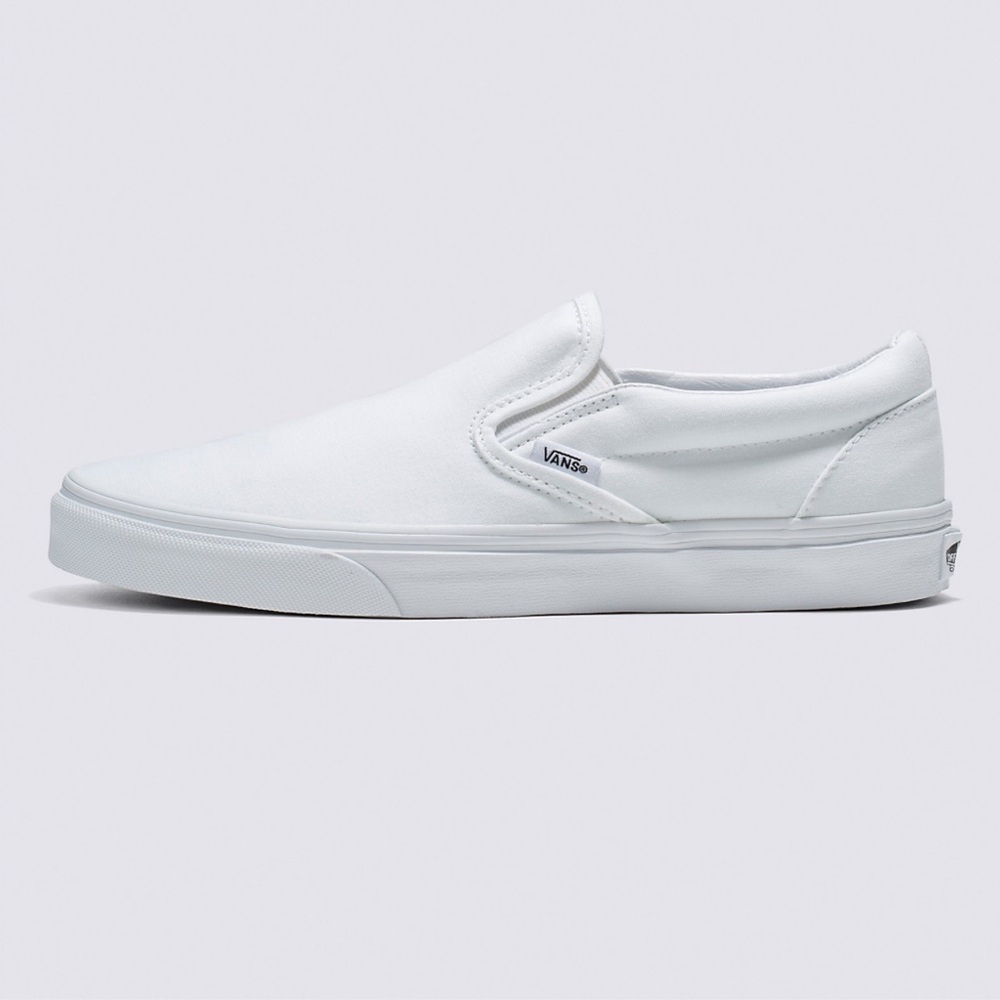 Vans white classic slip ons